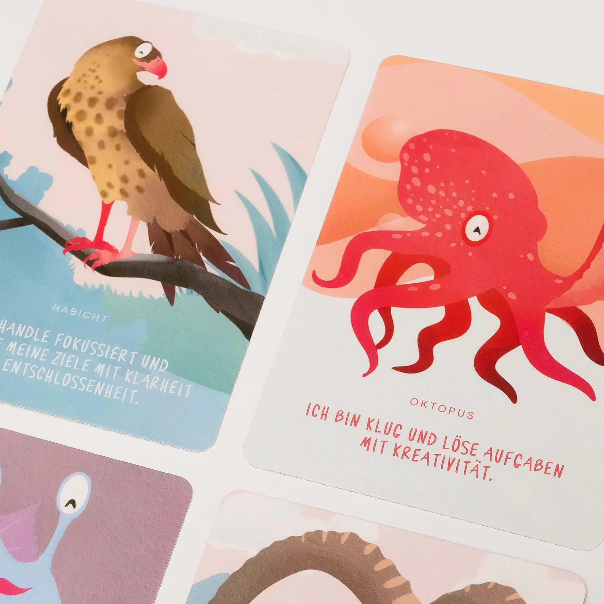 Krafttierkarten Detail – Habicht und Oktopus mit Affirmationstexten